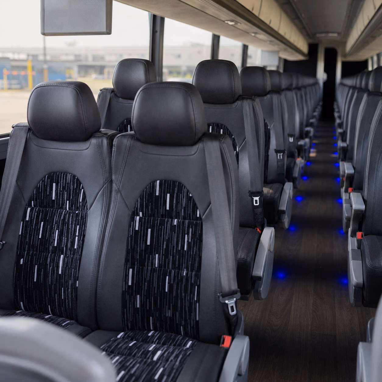 how starting location and deadhead affect charter bus rates in sterling heights